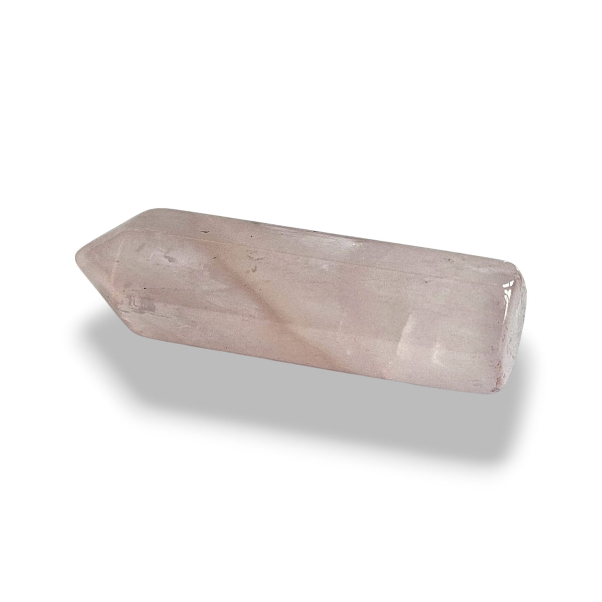 Rose quartz crystal point, natural polished stone, view 2