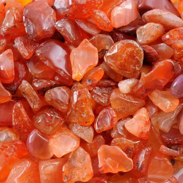 Natural Carnelian crystals and jewellery, warm orange to red-brown