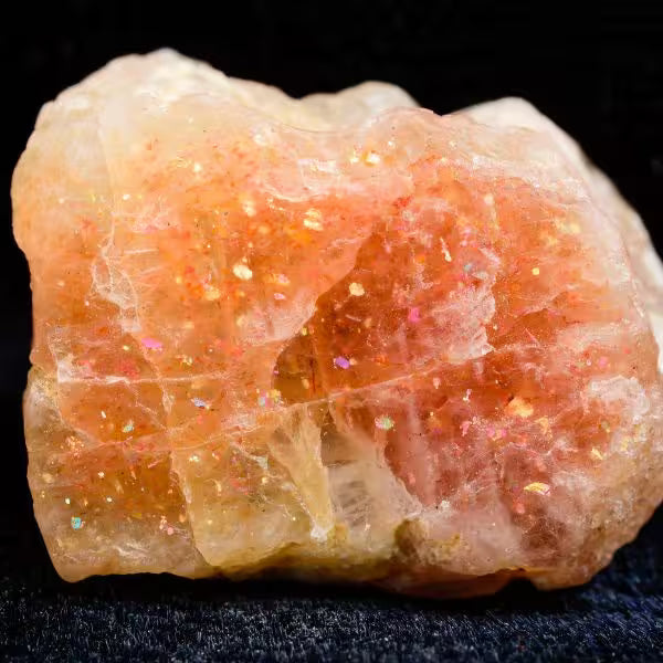 Natural Sunstone crystals and jewellery, warm orange with a glittering shimmer