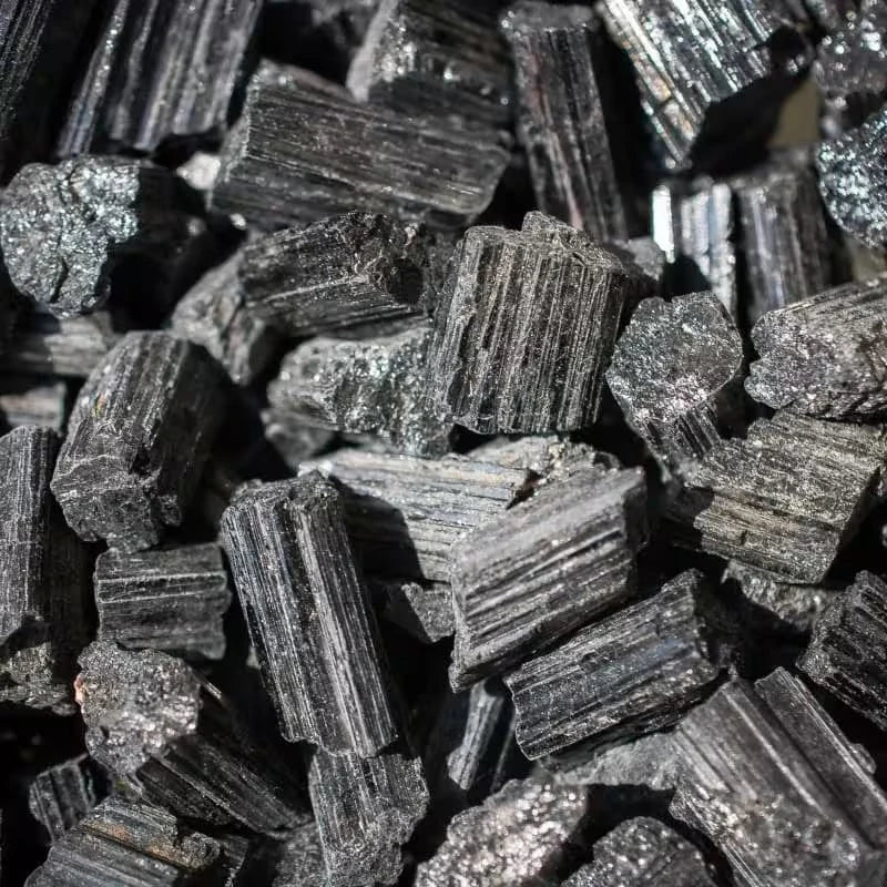 Natural Tourmaline crystals and jewellery, richly coloured, often jet black