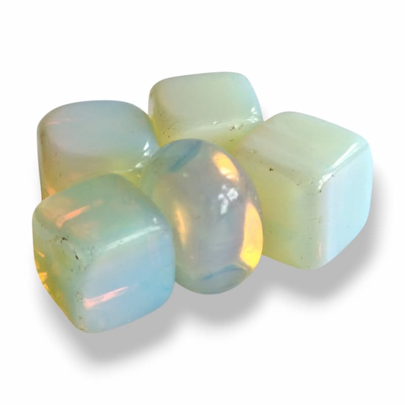 Hand-polished Opalite cube, translucent man-made opalescent glass with a warm amber glow
