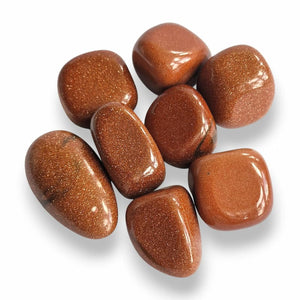 Brown goldstone polished tumblestone, glittering man-made glass with copper flecks