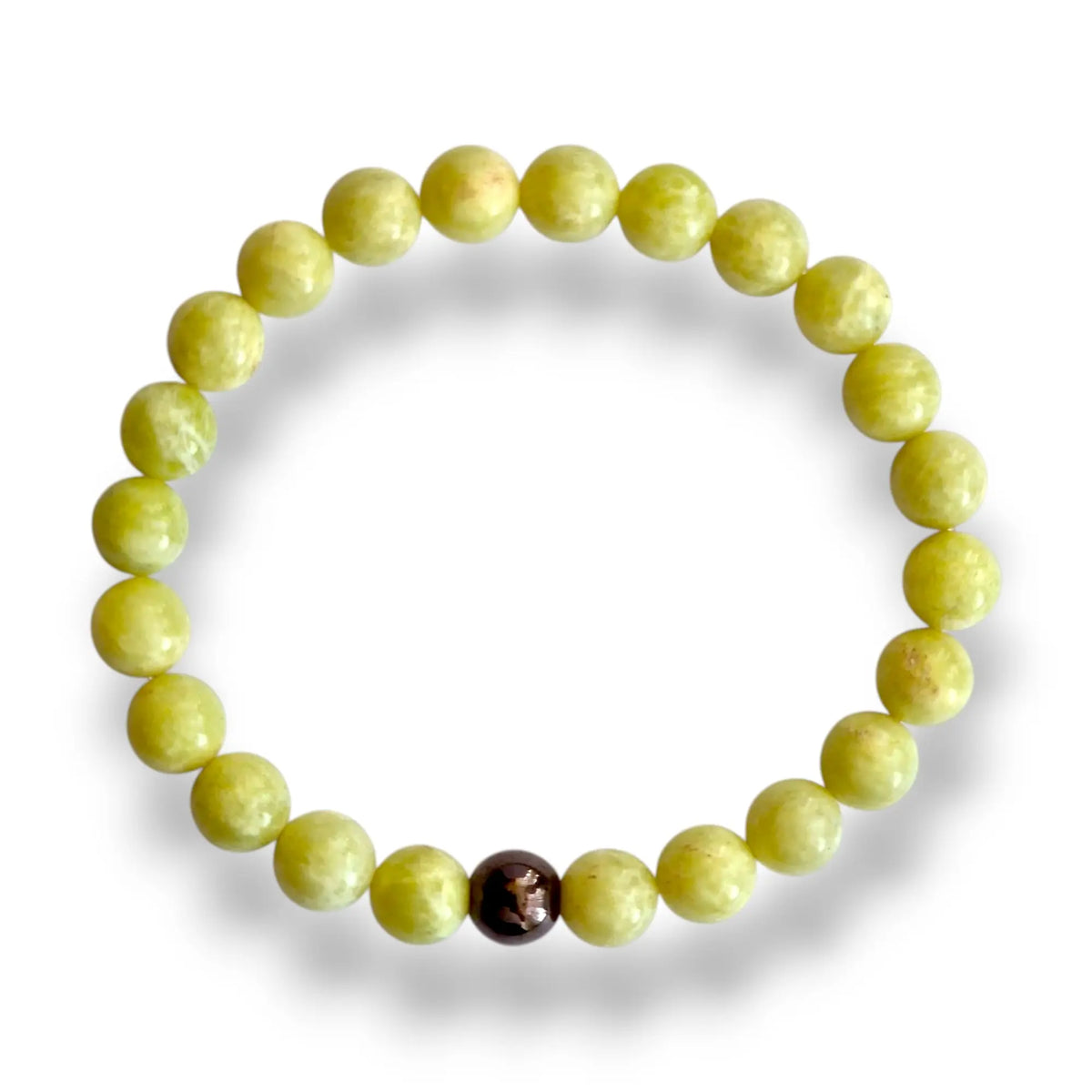 Close view of lemon jasper beads with cream markings on a stretch cord bracelet, 7.5 inch