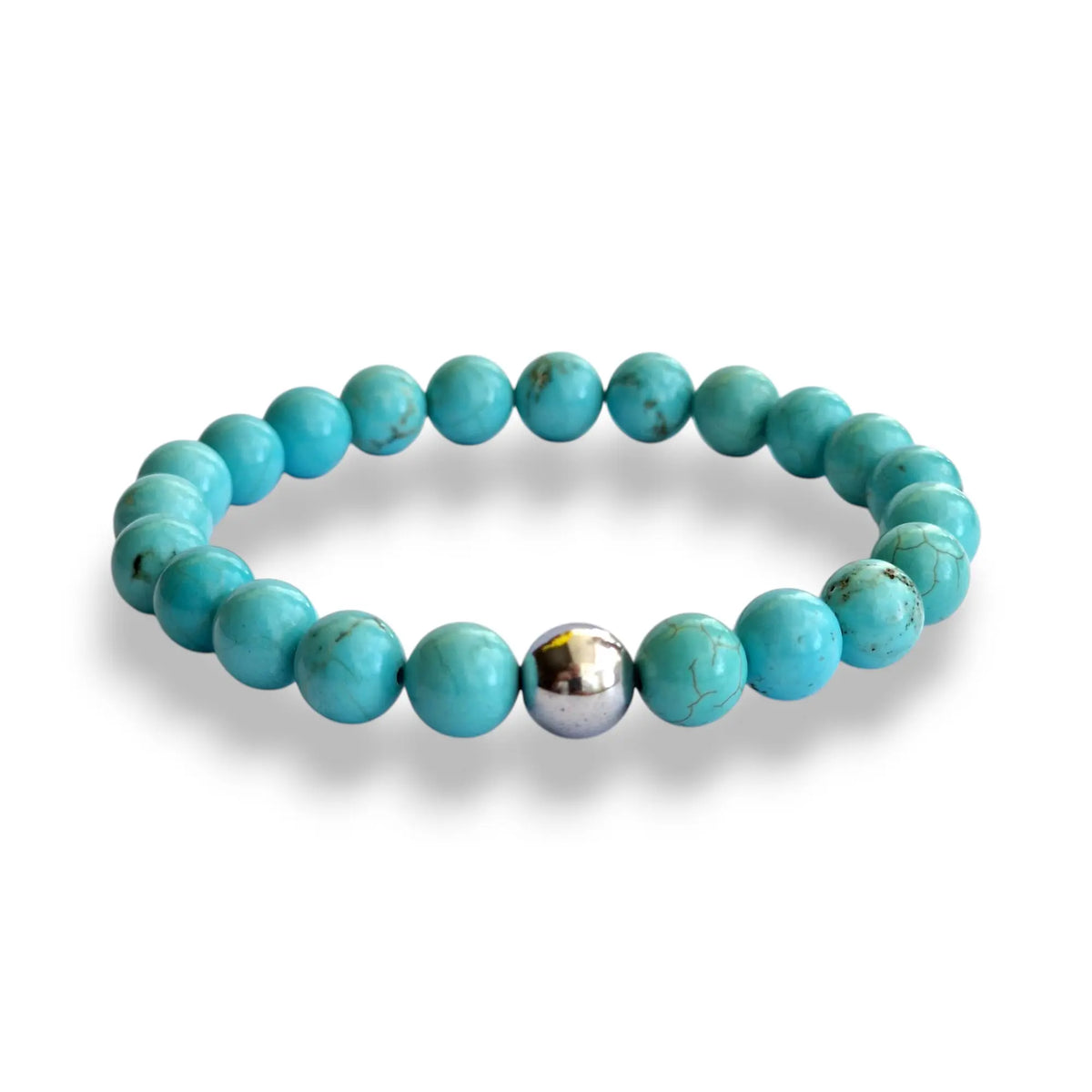 Turquoise howlite and hematite beaded bracelet with fine brown veining on a stretch cord, view 2