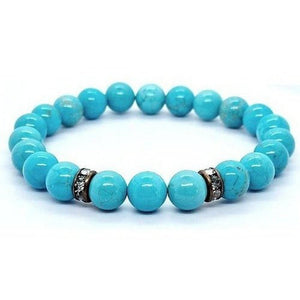 Turquoise howlite beaded bracelet with bright blue 8mm beads and two rhinestone rondelles