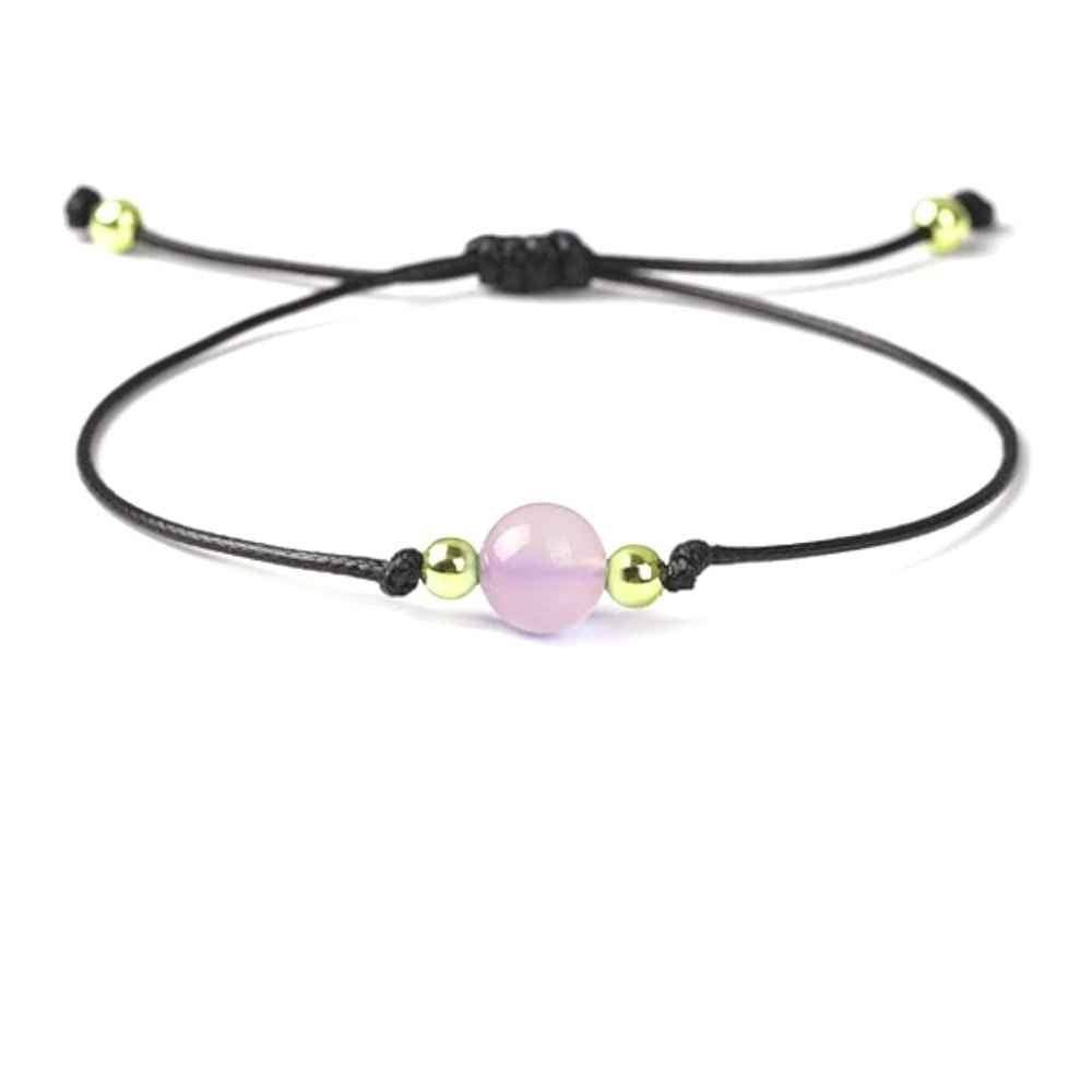 Rose quartz beaded bracelet in soft pink natural stone on a wax cord
