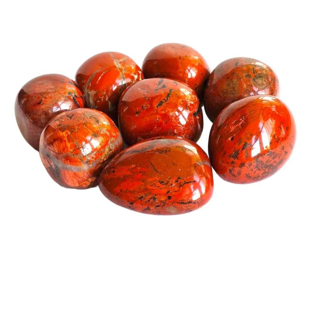 Red jasper polished tumblestone in brick-red natural stone