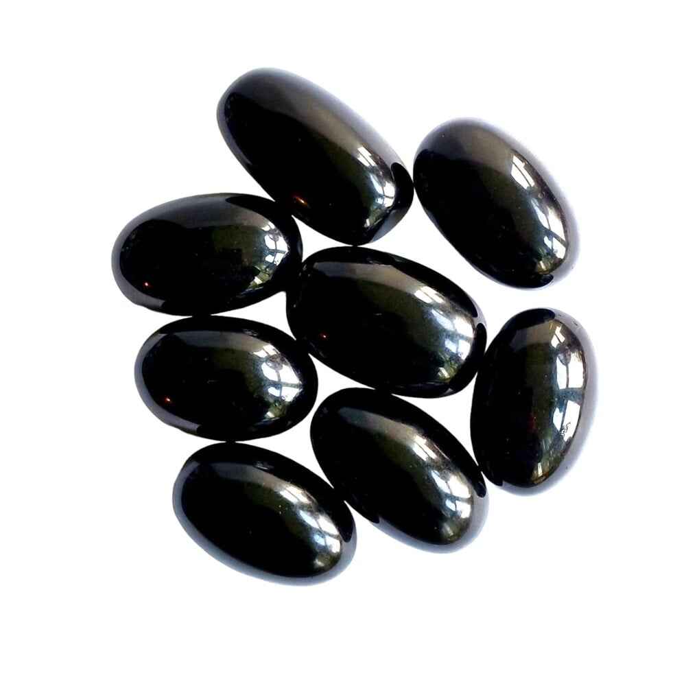 Black obsidian polished tumblestone, glossy black volcanic glass