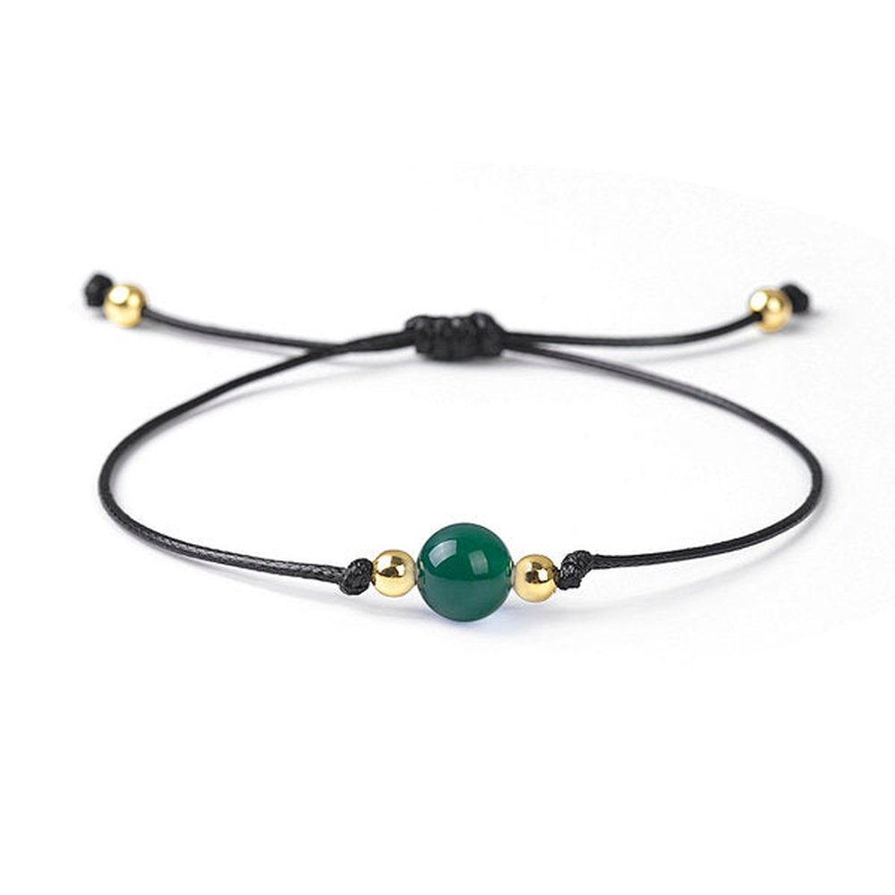 Green agate beaded bracelet in fresh green natural stone on a wax cord
