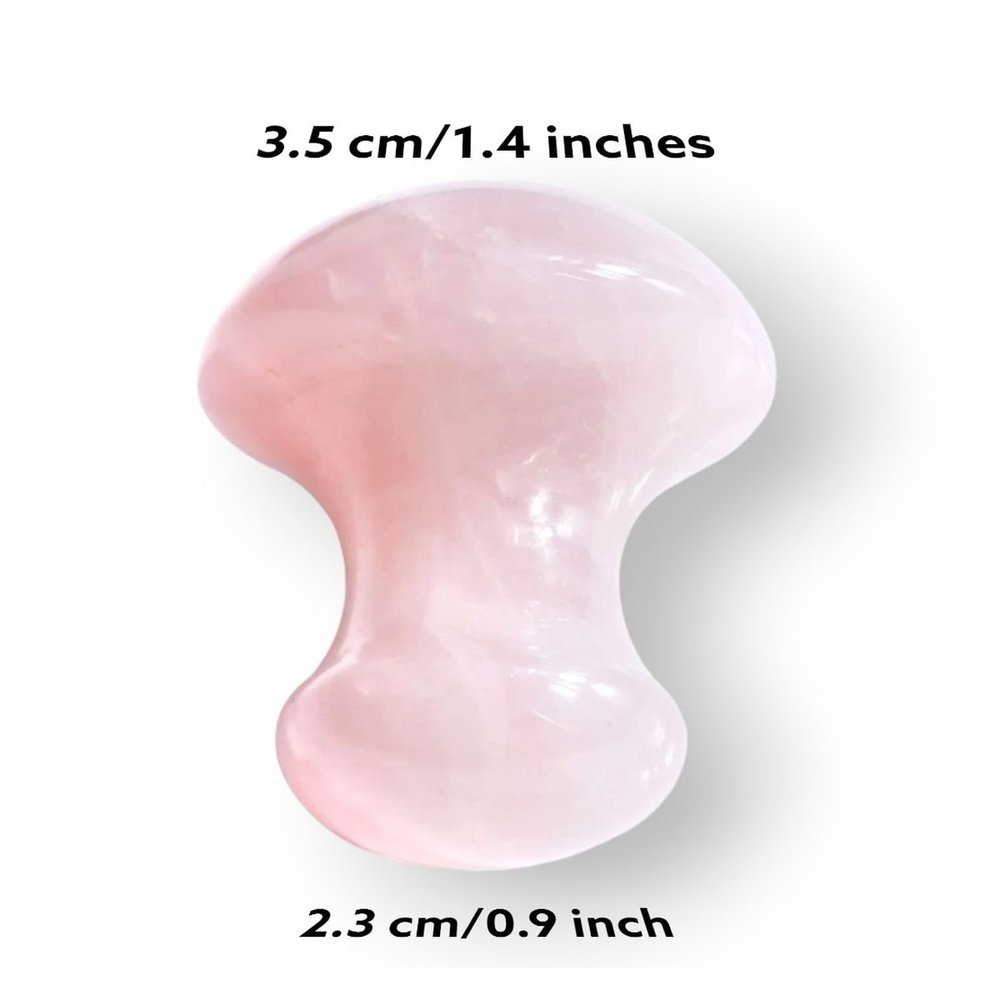 Rose Quartz Gua Sha tool, 3.5 cm by 2.3 cm, smooth pink surface for facial massage.