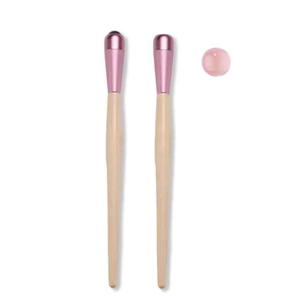 Rose quartz massage stick, a natural stone skincare tool