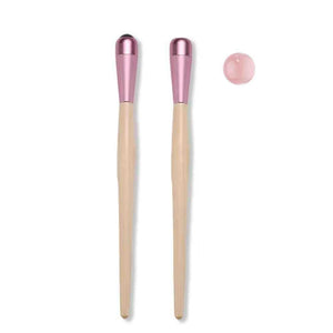 Rose quartz massage stick, a natural stone skincare tool