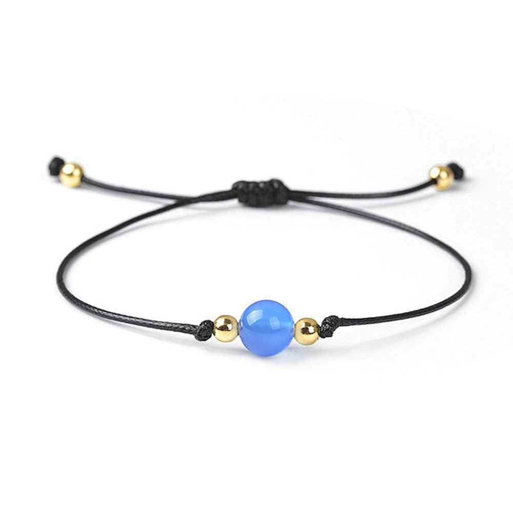 Blue agate beaded bracelet in soft blue natural stone on a wax cord